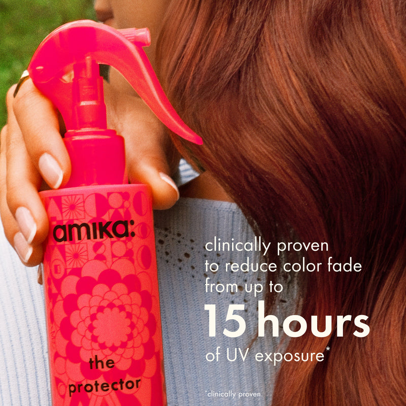 woman with vibrant hair holds the protector treatment. text reads: "clinically proven to reduce color fade from up to 15 hours of UV exposure." Asterisk and "clinically proven" at bottom.