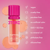 Amika product with features listed on a pink background