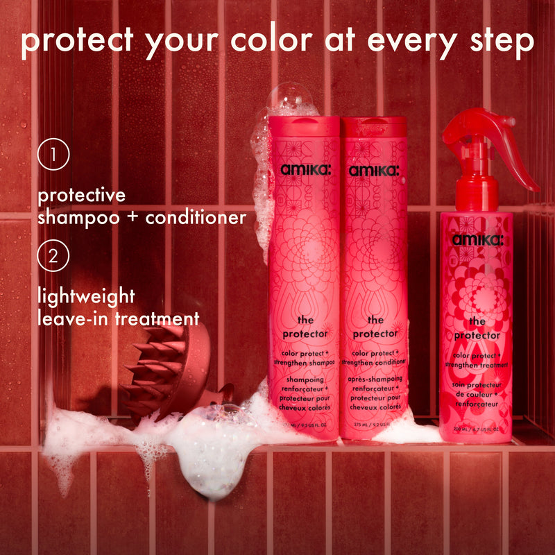 Three red bottles (shampoo, conditioner, treatment spray) with foam on red tiled background. Text: "protect your color at every step" with two-step system labeled.
