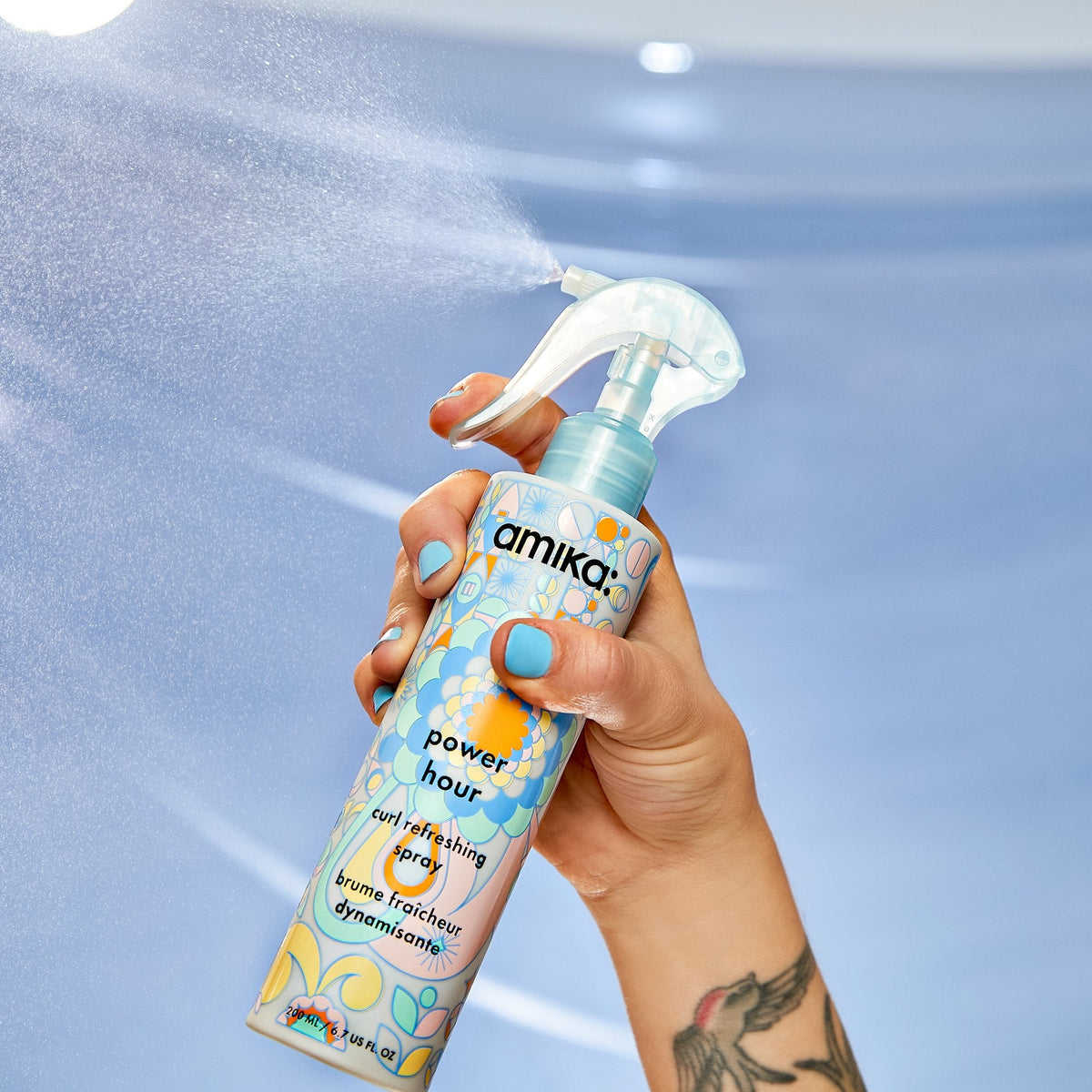 power hour: curl refreshing spray | amika pro