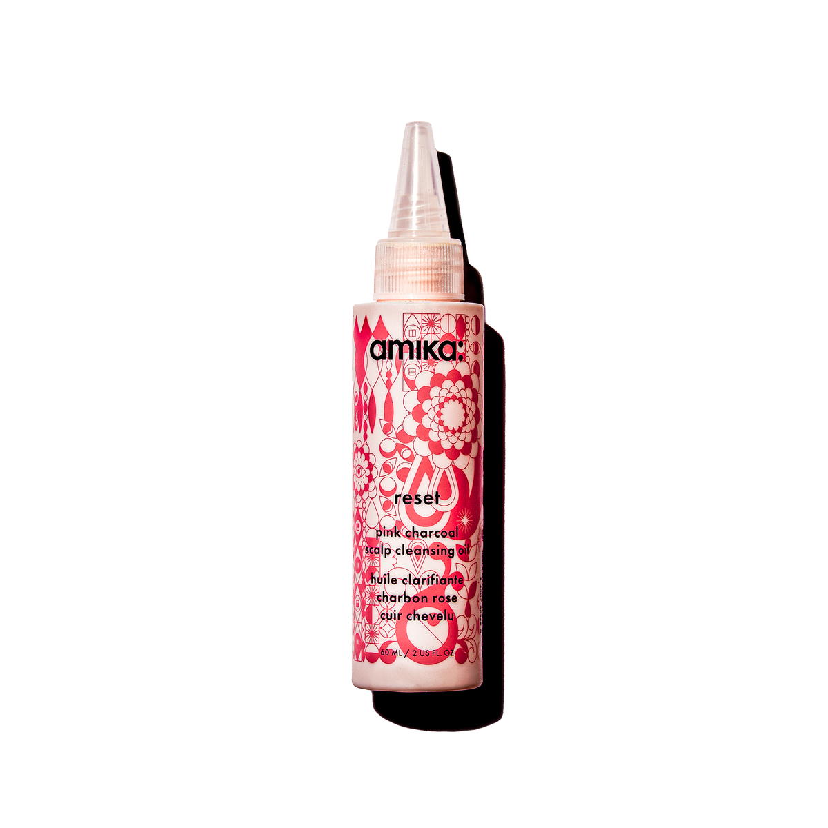 reset: pink charcoal scalp cleansing oil | amika pro